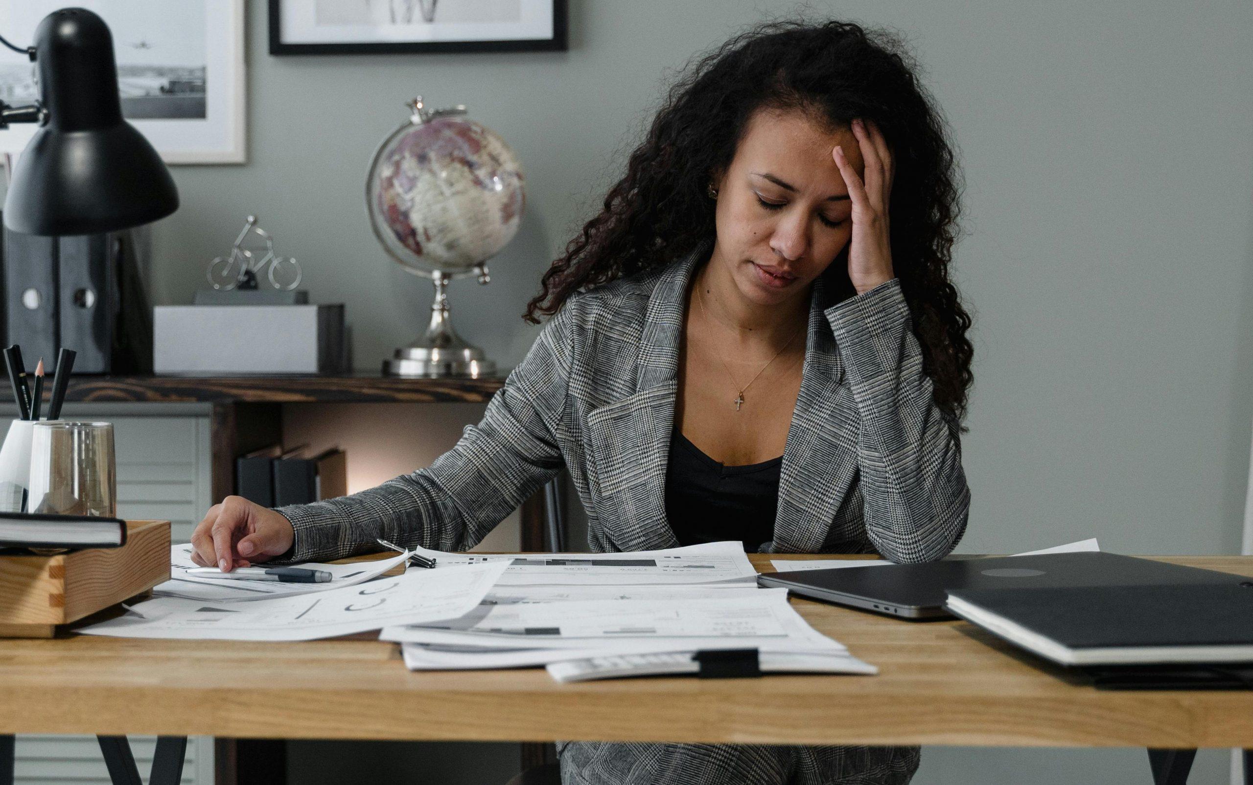 A busy practice owner is overwhelmed by administrative tasks.